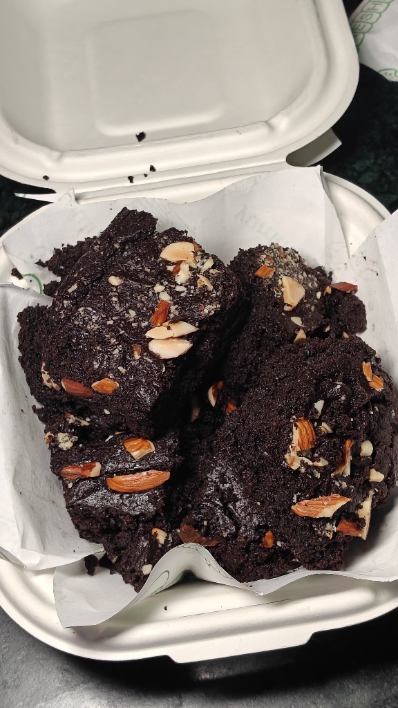 Crustora rich fudgy chocolate brownies loaded with toasted almonds